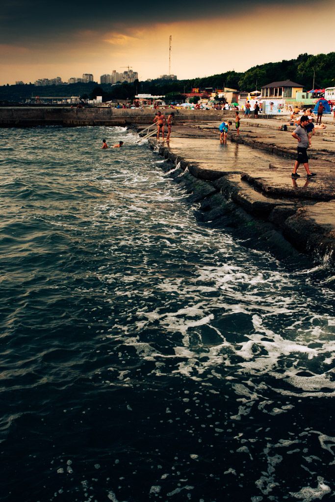 Bathers on a sea wall