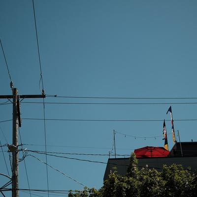 Power lines above a rooftop