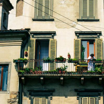 Shuttered facade and balcony