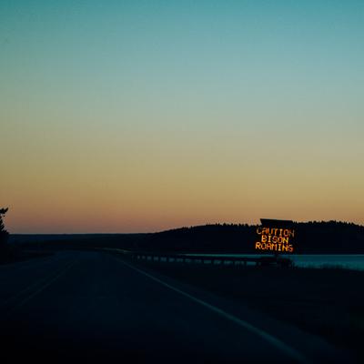 Highway message board at dusk