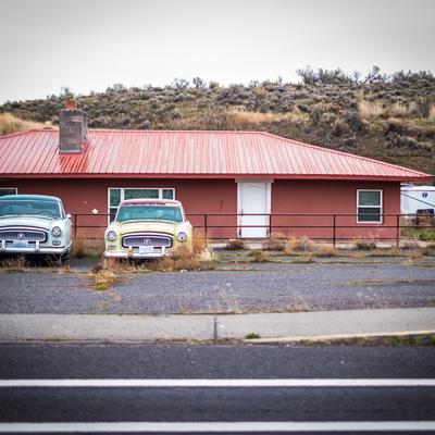 Pickups outside a roadside building