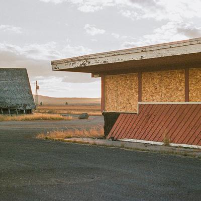 Boarded-up building and empty lot