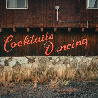 Cocktails and dancing sign