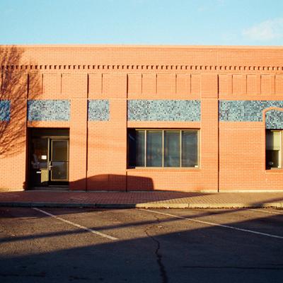 Orange building on a street